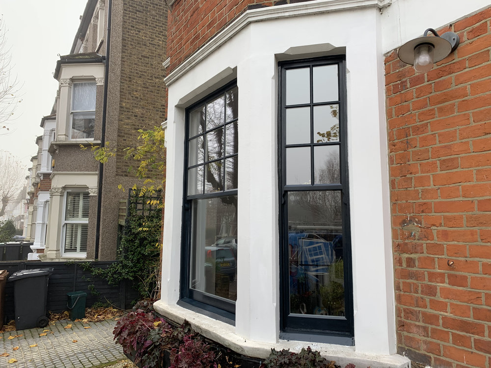 Timber sash window in London property showing typical structure repaired for smooth operation
